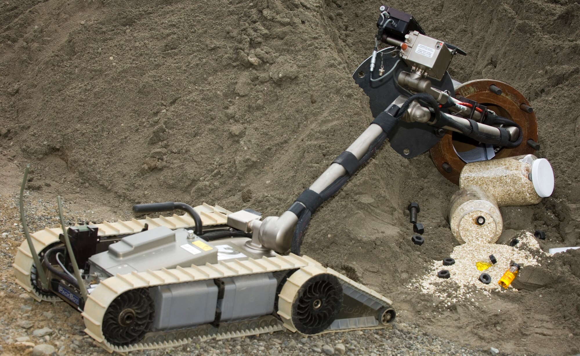 An unmanned ground vehicle designed to enter contaminated areas, controlled by the 95th CR and 3rd CES, assesses the threat level of contaminants during Northern Edge.
