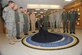 Gen. Kevin Chilton, commander of United States Strategic Command, unveiled  the new USSTRATCOM shield inlaid at the command building’s entrance April 24. The general compared the new shield to the existing Strategic Air Command patch on the floor here, saying, “When people walk into the Strategic Command building I wan them to appreciate our heritage, but I also want then to honor and understand the importance of the mission set we have now, which is tremendously larger than it was in the day of SAC.” He was joined at the ceremony by the USSTRATCOM vice commander, Vice Adm. Carl Mauney, and the command’s senior enlisted leader, Fleet Master Chief William Nissen along with the eight USSTRATCOM Joint Funcional Component commanders or their representatives. Pictured are (l to r): Brig. Gen. Jeffrey Horne, deputy commander, JFCC-Space; Maj. Gen. James Whitmore, deputy commander, JFCC-Intelligence, Surveillance and Reconnaissance; Lt. Gen. Robert Elder, commander, JFCC-Global Strike and Integration; Lt. Gen. Keith Alexander, commander, JFCC-Network Warfare; Vice Admiral Mauney; General Chilton; Master Chief Nissen; Lt. Gen. Charles Croom, commander, Joint Task Force Global Network Operations; Lt. Gen. Kevin Campbell, commander, JFCC-Integrated Missile Defense; Maj. Gen. Craig Koziol, commander, Joint Information Operations Warfare Command and Rear Adm. William Loeffler, deputy director, U.S. Strategic Command Center for Combating Weapons of Mass Destruction. (U.S. Air Force Photo By/ Daniel Rohan)