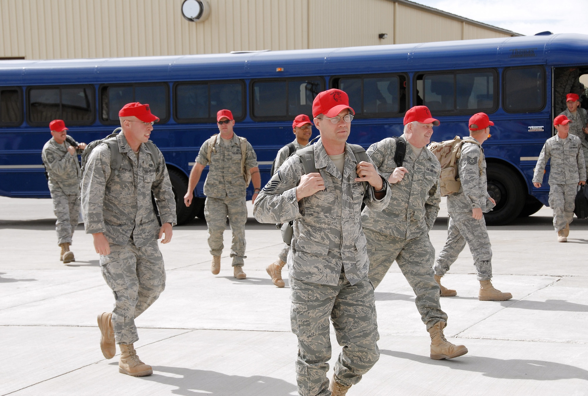 Airmen from the 819th RED HORSE Squadron return from a six-month deployment in support of the war on terrorism. They were welcomed by friends and family members at the RED HORSE Hangar at Malmstrom Air Force Base, Mont., April 14. (U.S. Air Force photo by John Turner)
