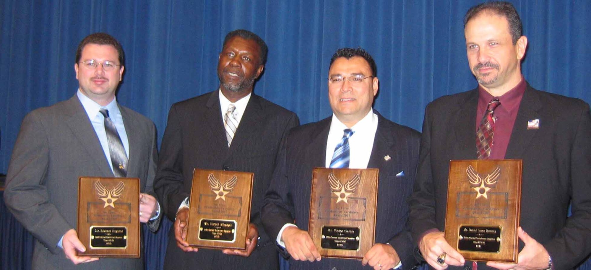 From left to right Richard England, Harold Mitchell, Victor Garcia and Daniel “Lance” Rumsey receive Air Force Productivity Excellence Awards in an April 8 ceremony at the Pentagon.  (Courtesy photo)