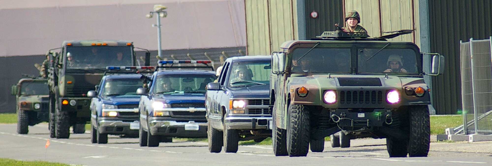 Divided into two groups, 100th CES and 48th CES personnel took turns to practice convoy training. During their field training exercise April 24 and 25, other training events included weapons handling, air base defense and land navigation. (U.S. Air Force photo by Karen Abeyasekere)