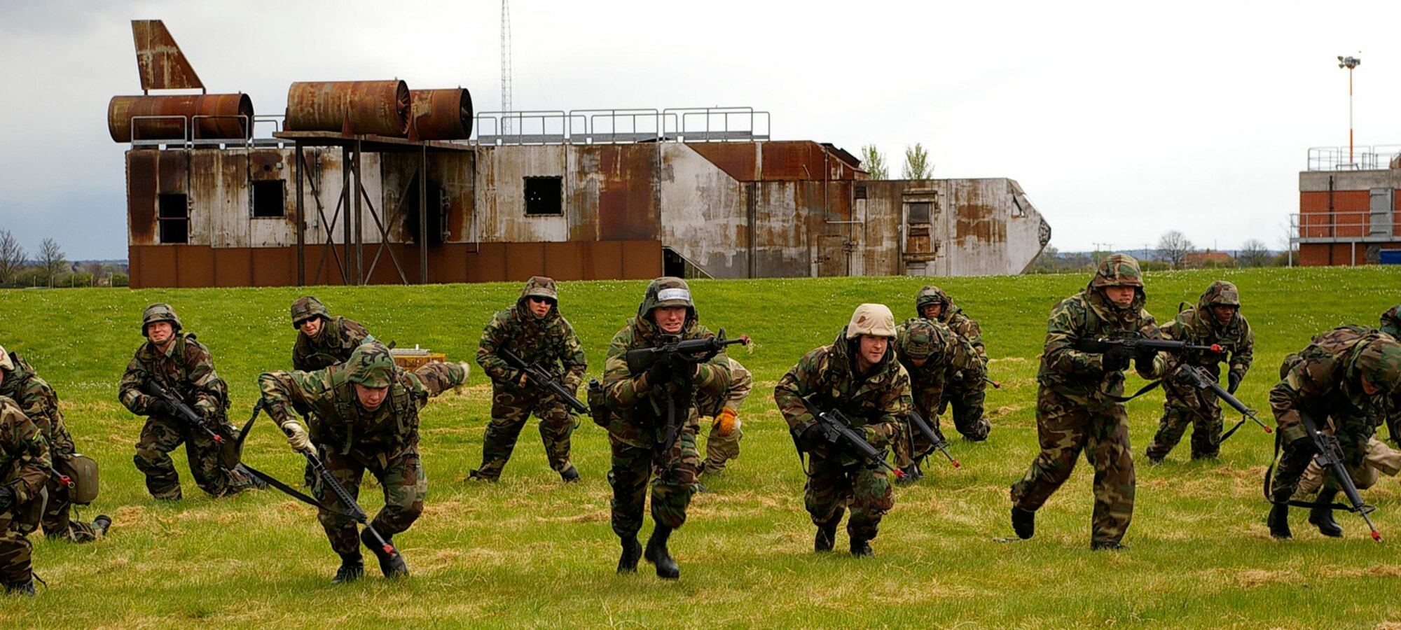 Troops from 100th CES and 48th CES practice defensive fighting procedures during their field training exercise April 24 and 25. (U.S. Air Force photo by Karen Abeyasekere)