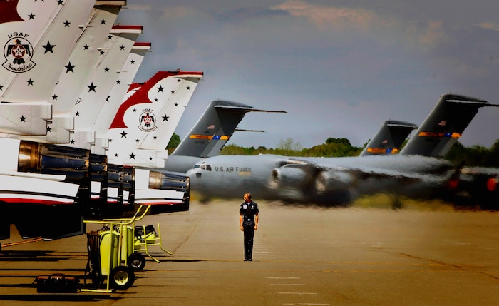 Staff Sgt. Walter Jenkins marshals in Thunderbird Four after arriving on the Charleston Air Force Base, S.C., flightline April 28. The Air Force Thunderbirds will perform at the 2008 "Wings Over Charleston" air expo May 3. Sergeant Jenkins is a crew chief for the Thunderbirds.  (U.S. Air Force photo by Senior Airman Nicholas Pilch)