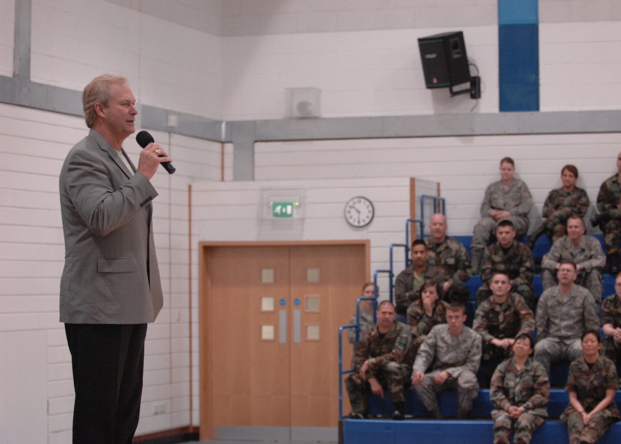 Dan Clark addresses Liberty Airmen April 24 at the Lakenheath Fitness Center at RAF Lakenheath, England. Mr. Clark told several motivational stories and encouraged Airmen to demand excellence of themselves. (U.S. Air Force photo by Airman 1st Class John Easterling)