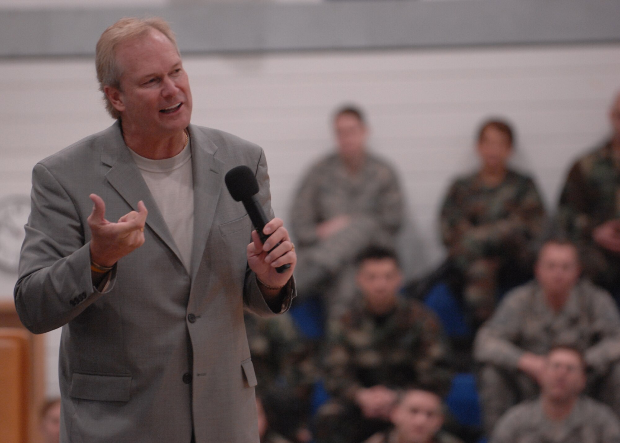 Dan Clark addresses Liberty Airmen April 24 at the Lakenheath Fitness Center at RAF Lakenheath, England. Mr. Clark told several motivational stories and encouraged Airmen to demand excellence of themselves. (U.S. Air Force photo by Airman 1st Class John Easterling)