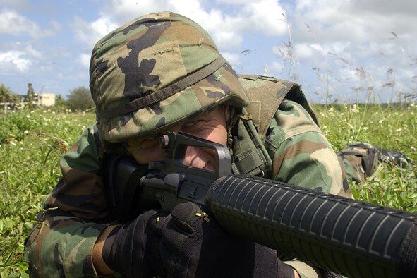Lt. Col. Peter Ridilla, 36th Civil Engineer Squadron Commander got down and dirty like the rest of his troops during the yearly 36th CES Field Training Exercise May 1. The FTX is a annual opportunity for 36th CES members to keep sharp for future deployment scenarios. (U.S, Air Force photo by Airman 1st Class Carissa Wolff)
