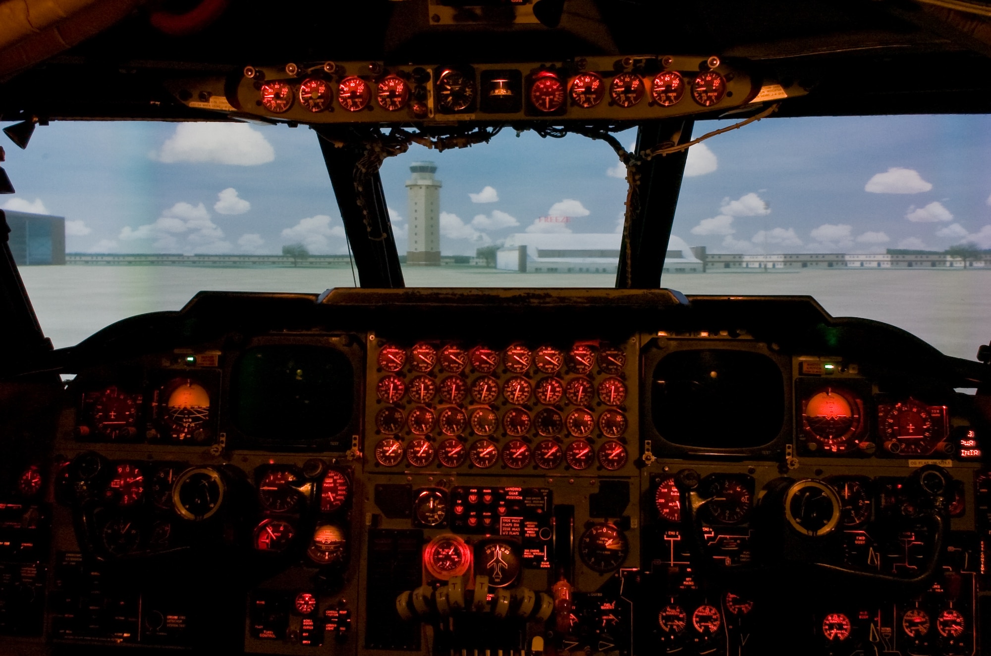 A virtual Barksdale Air Force Base, La., flightline can be seen through the windshield of a B-52 Stratofortress simulator April 28 at Barksdale AFB. A new dome projection surface provides a more realistic view for pilots training on the simulator. (U.S. Air Force photo by Lance Cheung)