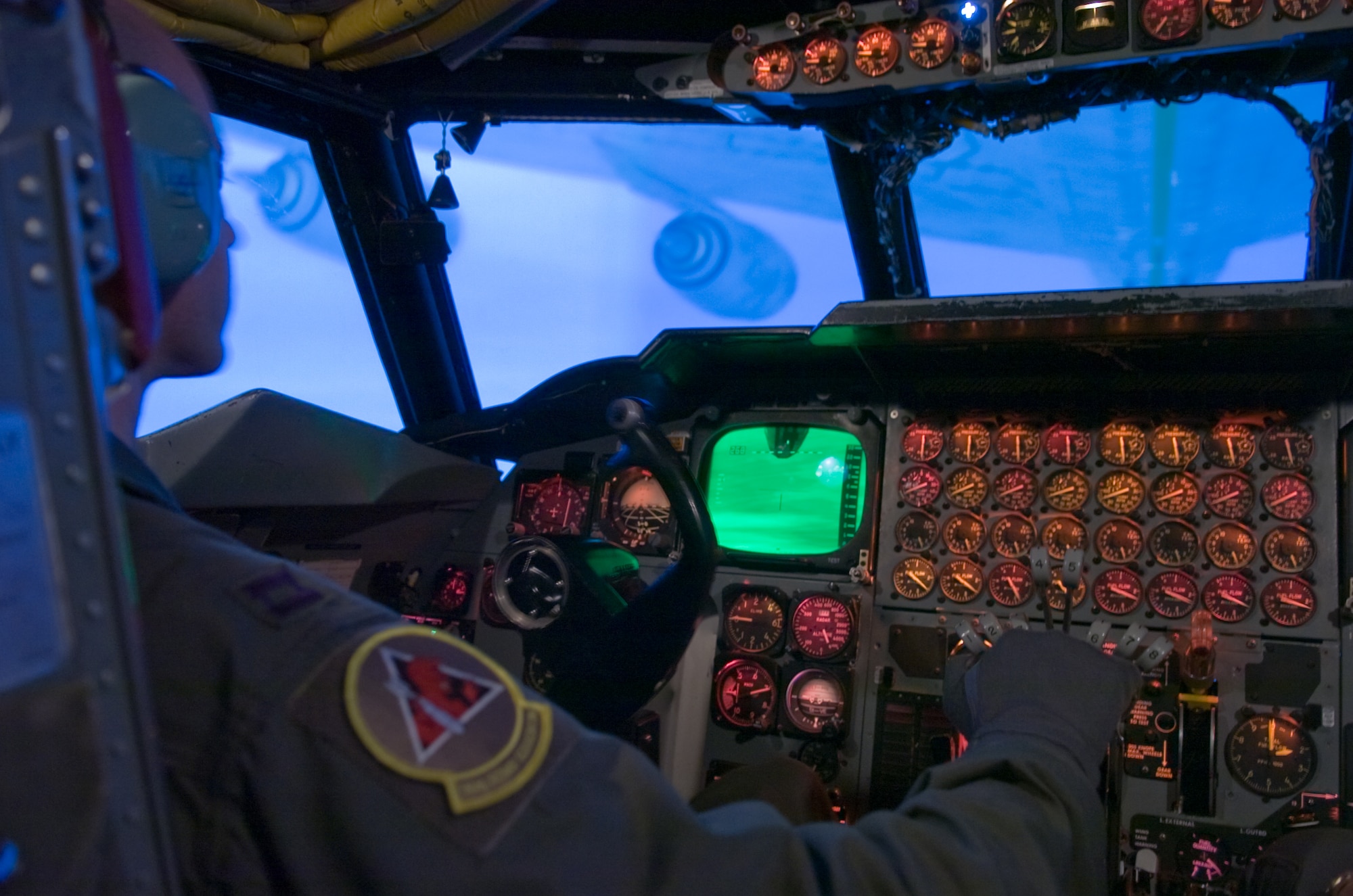 Capt. Joseph Babboni trains on a B-52 Stratofortress simulator April 28 at Barksdale Air Force Base, La. to improve his proficiency at air refueling. An actual flight in a B-52 bomber costs approximately $16,000 per hour. The flight simulator costs approximately $400 per hour to operate. Despite the cost savings, not all training can be a conducted in a simulator. Capt. Babboni is a pilot with the 11th Bomb Squadron. (U.S. Air Force photo/Lance Cheung)