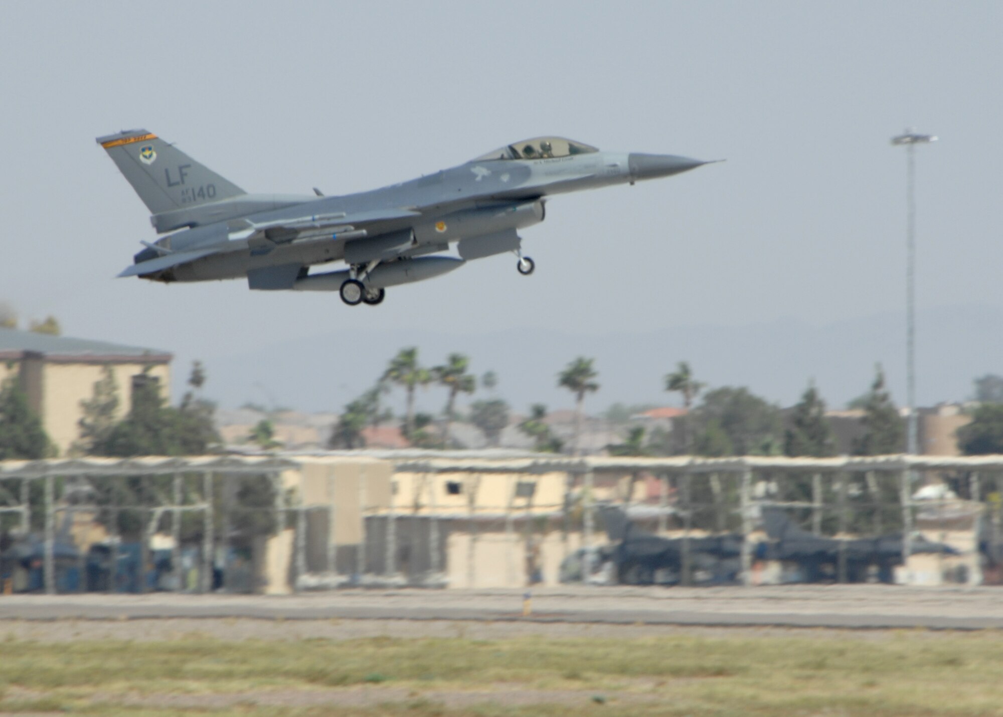 An F-16 prepares to land at Luke. While most landings at the base are routine, when Normandin landed his aircraft March 25 he was credited with saving the multi-million dollar jet and crew. (U.S. Air Force photo by Tech. Sgt. Raheem Moore/Released)