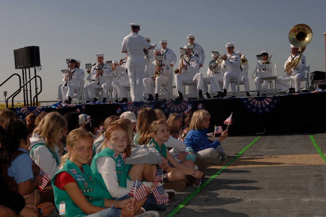 Navy Band Southwest serenades more than 900 Girl Scouts, troop leaders, military personnel and community supporters, aboard the USS Midway in support of Operation Thin Mint Sendoff, May 4. San Diego Girl Scouts collected 220,812 boxes of cookies to send to deployed U.S. military troops.