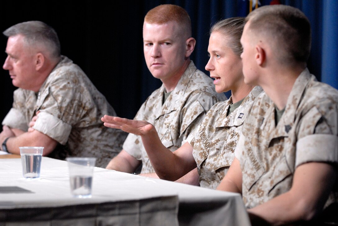 From left: U.S. Marine Lt. Gen. George J. Trautman, Lt. Col. Paul Rock, Capt. Sara Faibisoff and Sgt. Danny Herrman answer questions about the initial combat deployment of the MV-22 Osprey during a press briefing at the Pentagon, May 2, 2008. All four Marines participated in the Marine Corps' first operational Osprey squadron. Defense Dept. photo by U.S. Navy Petty Officer 2nd Class Molly A. Burgess   