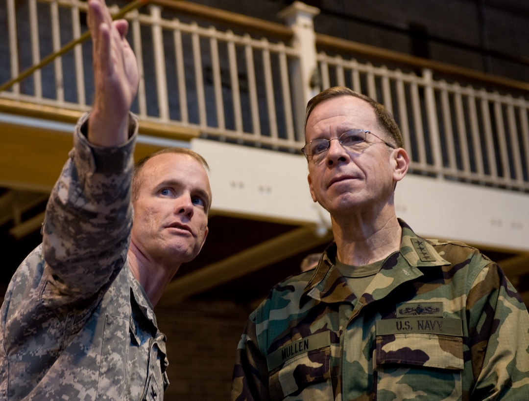 Army Col. Greg Daniels, left, director of the United States Military Academy's Physical Education Department gives a tour of physical education facilities to Navy Adm. Mike Mullen, chairman of the Joint Chiefs of Staff, in West Point, N.Y., by , May 2, 2008. 