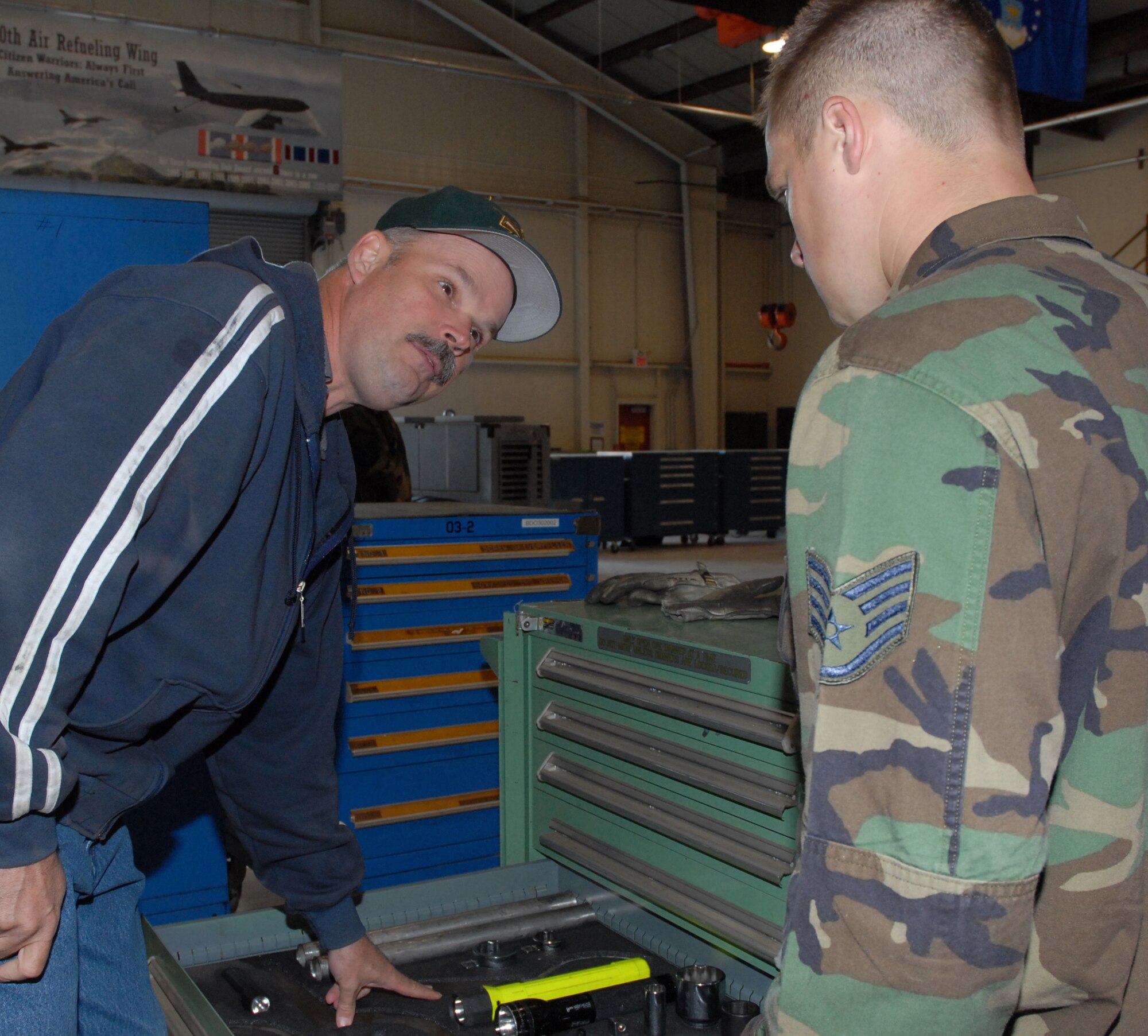 BEALE AIR FORCE BASE, CALIF. -- Mr. Ed Walker, 940th Maintenance Group aircraft pneudraulics technician, inventories tools with Staff Sergeant Jason LeClair, 916th MXG, Seymour Johnson Air Force Base, N.C., Apr. 30, 2008. The last two jets assigned to the Air Force Reserve's 940th Air Refueling Wing here departed May 3 for their new home with the 916th ARW, Seymour Johnson AFB, N.C. (U.S. Air Force photo/Master Sgt. Ellen L. Hatfield)