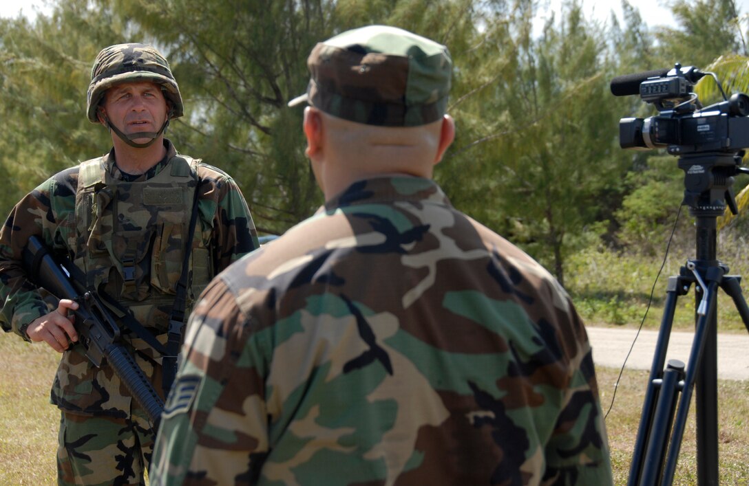 Lt. Col. Peter Ridilla 36th Civil Engineer Squadron commander gave an interview about the field training exercise May 1 to Staff Sgt. Pedro Jimenez 36th Wing Public Affairs. The interview went over details of the FTX and what 36 CES gained from their week long deployment training. (U.S. Air Force photo by Airman 1st Class Courtney Witt)