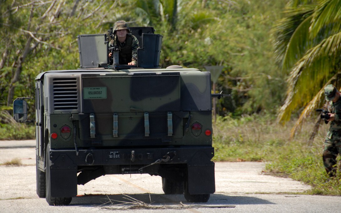 Airman 1st Class Danielle Tomlinson 36th Civil Engineer Squadron proved that women can be placed in deployment scenarios as easy as their male Air Force counterparts. She was the gunner for the convoy training during 36 CES most recent field training exercise. (U.S. Air Force photo by Airman 1st Class Courtney Witt)