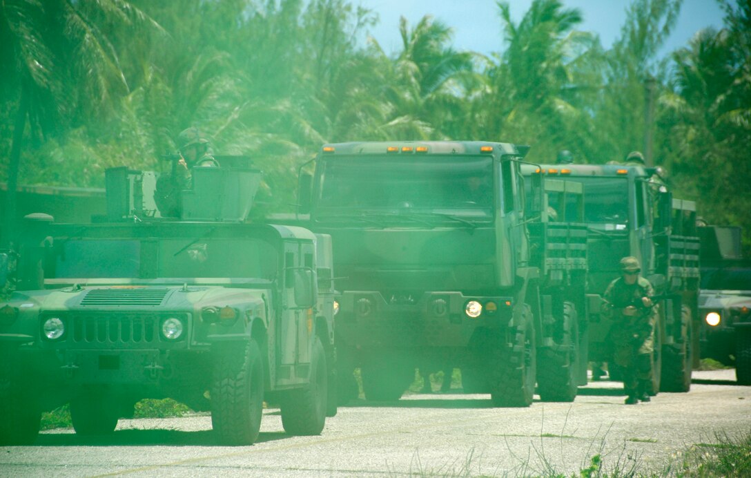 Members of the 36th Civil Engineer Squadron received convoy training during their most recent field training exercise where members of the 36th Security Forces Squadron posed as protestors throwing smoke grenades. (U.S. Air Force photo by Airman 1st Class Courtney Witt)