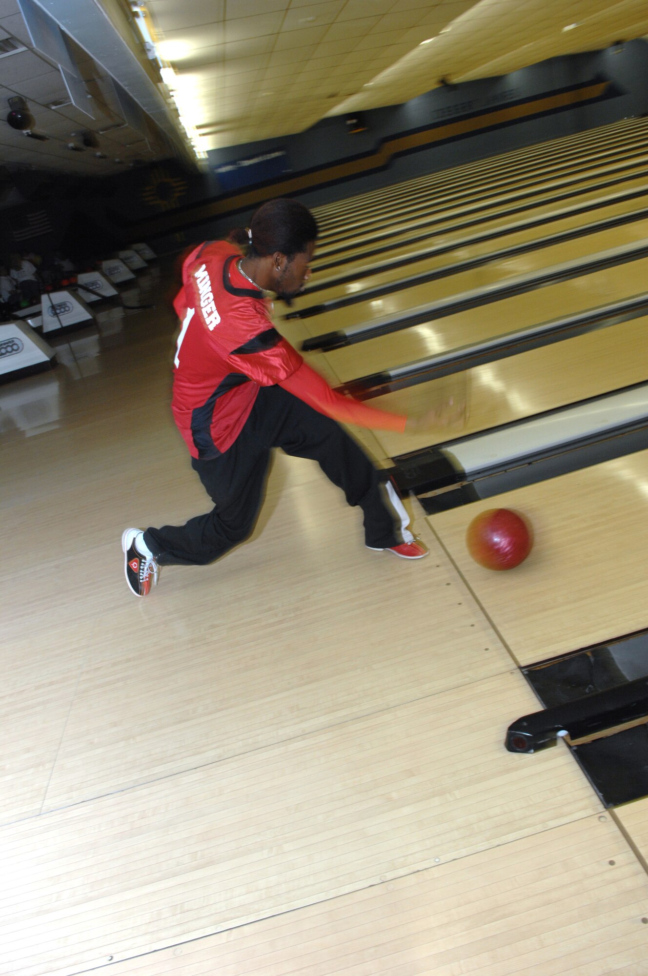 Donte' Minger bowls during Bowl For Kid's Sake, presented by Big Brothers Big Sisters of Otero County April 14, 2008 at Holloman Air Force Base, N.M. Mr. Minger is a member of the Semi-pro football team Alamogordo Desert Dawgs, volunteer for Big Brother's Big Sisters, and a prior active duty Air Force member. (U.S. Air Force photo/ Senior Airman Anthony Nelson Jr)