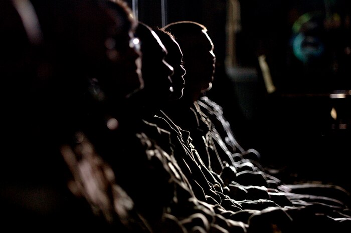 Army Soldier 'extras' played by Airman from Charleston Air Force Base, S.C., sit in what is the background of a scene inside a C-17 Globmaster III May 5, 2008. (U.S. Air Force photo/Senior Airman Nicholas Pilch)