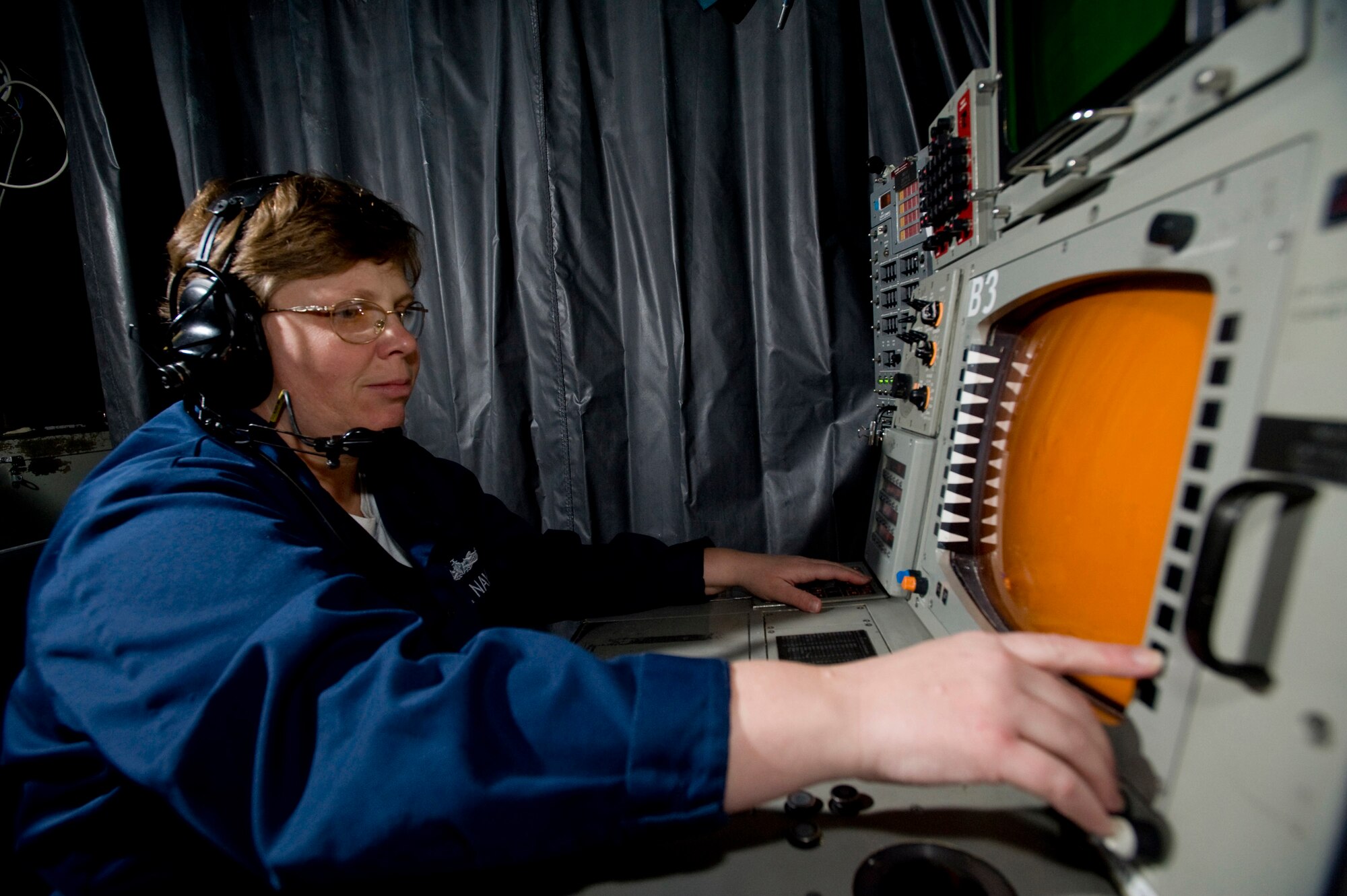 SEWARD, Alaska—Petty Officer 1st Class Tonya Grey a air warfare coordinator on board John Paul Jones watches over her monitor at Seward's harbor on  May 3, 2008. The John Paul Jones a Arleigh Burke class destroyer will be participating Northern Edge, a two week joint exercise allows U.S. forces to train for regional and world wide crisis.(U.S. Air Force Photo by Airman 1st Class Jonathan Steffen)(RELEASED)