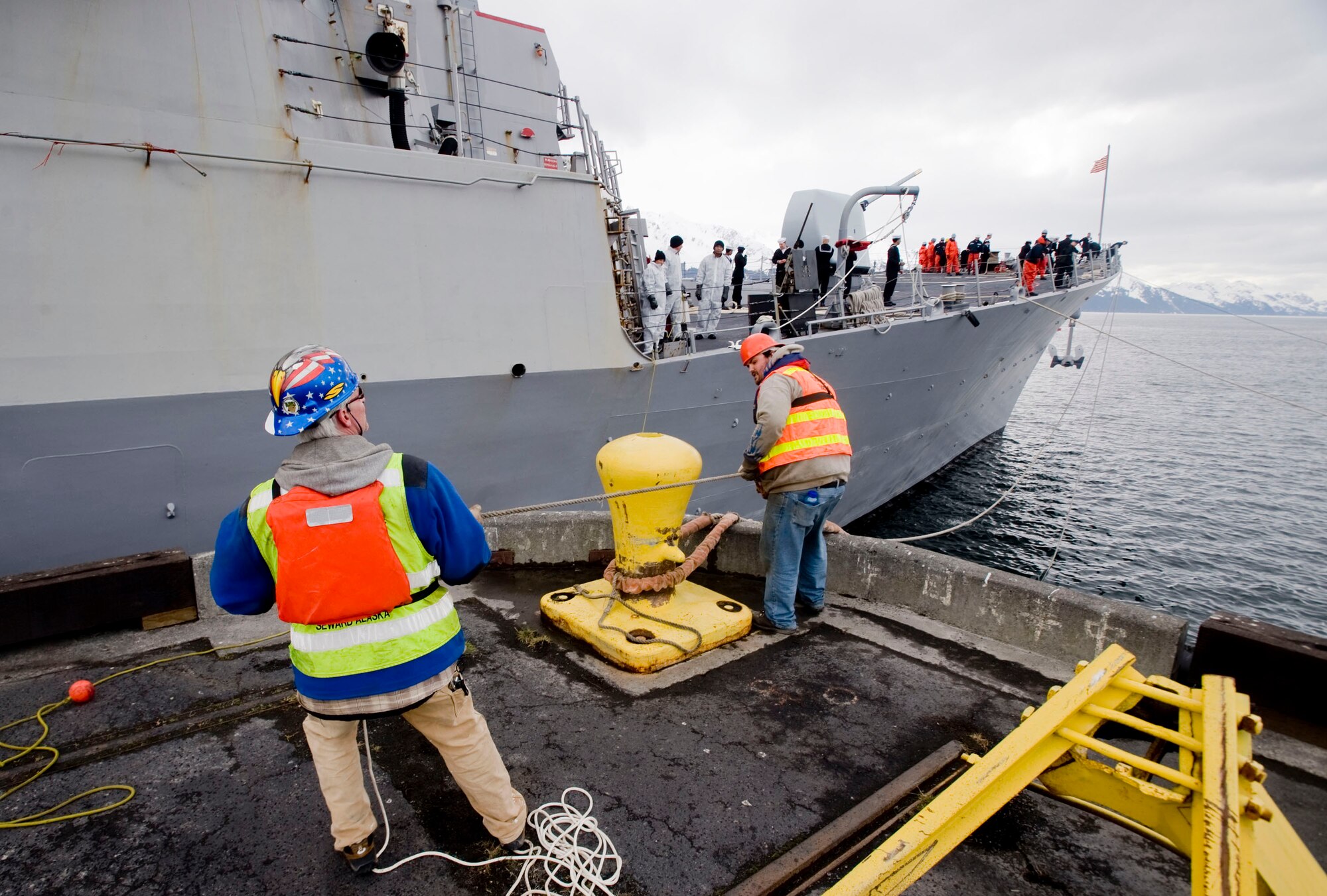 SEWARD, Alaska— Thomas Shea and Elmo Raekey long shore man for Seward harbor pulls in U.S. Navy John Paul Jones on May 3, 2008. The John Paul Jones a Arleigh Burke class destroyer will be participating Northern Edge, a two week joint exercise allows U.S. forces to train for regional and world wide crisis.(U.S. Air Force Photo by Airman 1st Class Jonathan Steffen)(RELEASED)