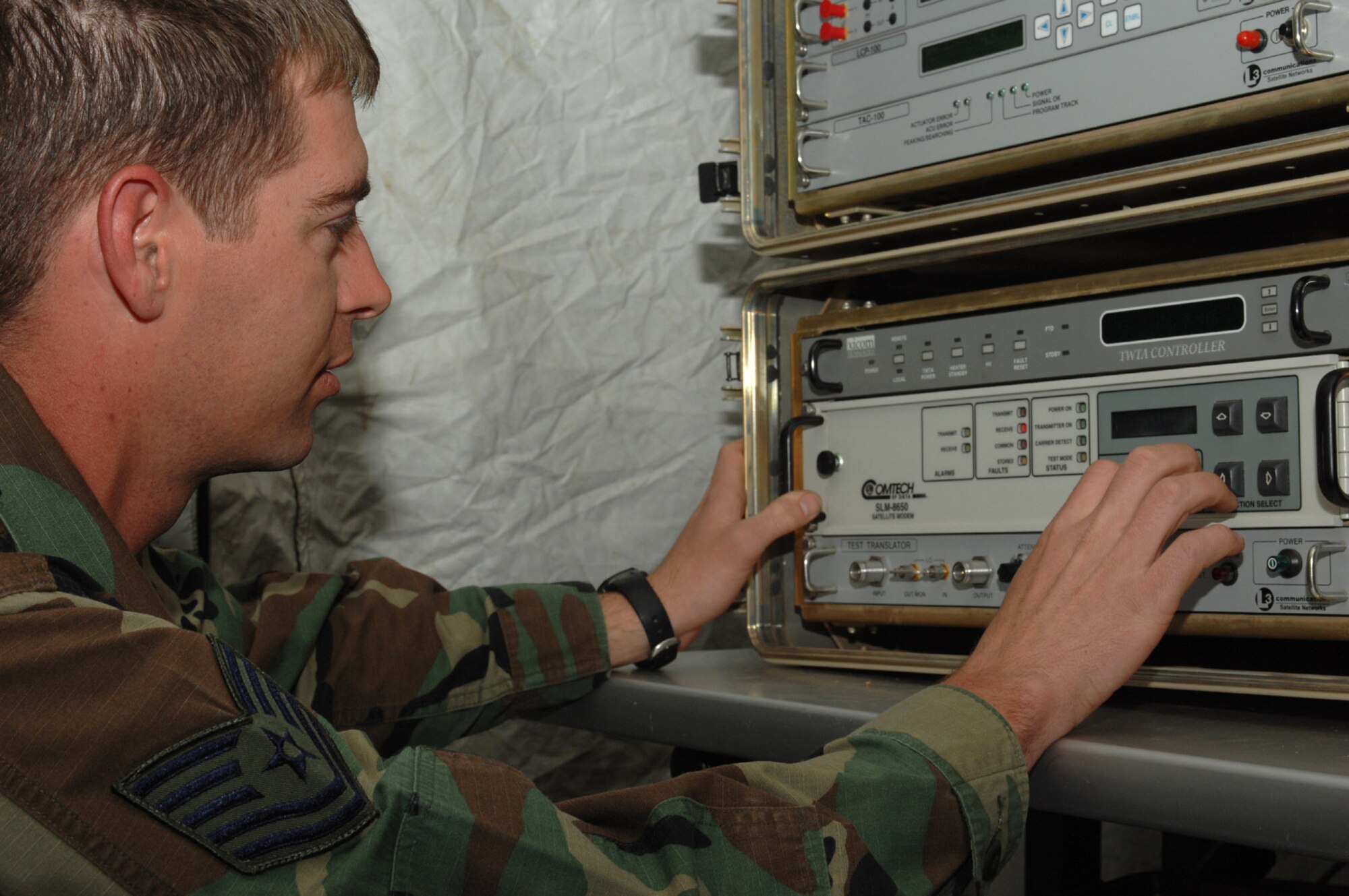 Tech. Sgt. Brett Olsen adjusts a modem April 29 at Divulje Training Base, Croatia. He is part of the forward team supporting Medical Central and Eastern Europe Exercise 2008, which 17 nations are participating in that runs May 2 through 15. The exercise focuses on mass-casualty training scenarios and humanitarian aid in response to crises situations. More than 400 multinationals are attending the exercise in support of the Partnership for Peace initiative. Sergeant Olsen is assigned to the 1st Combat Communications Squadron from Ramstein Air Base, Germany. (U.S. Air Force photo/Staff Sgt. Kristin Ruleau) 
