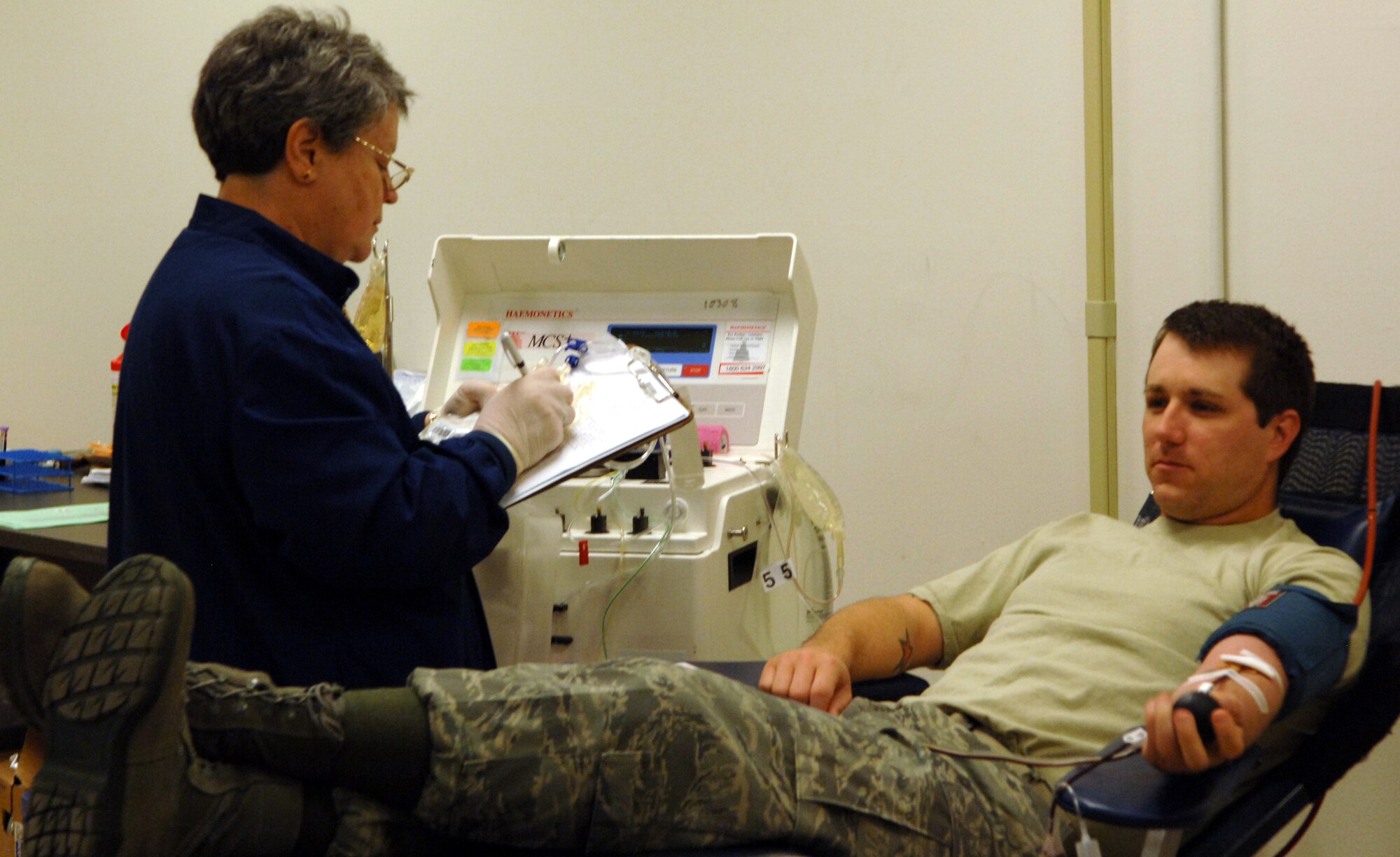 Tech. Sgt. Troy Holley, 372nd Training Squadron Detachment 8 avionics instructor, provides a double red cell donation for a blood drive sponsored by United Blood Services at the Entrican Center here, May 1.  According to United Blood Services, one blood donation can save the lives of three other people.  (U.S. Air Force photo/ Airman 1st Class Abigail Klein)