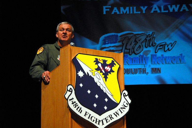 U.S. Air Force Colonel Mark R. Johnson, 148th Fighter Wing Commander Minn. Air National Guard, addresses the audience of nearly 2,000 people showing their support for the members of the wing who will be deploying in support of the Global War on Terror, Feb. 4, 2007.  The Wing held a deployment ceremony at the Duluth Entertainment and Convention Center to say farewell to the troops.  (U.S. Air Force photo by Tech. Sgt. Brett R. Ewald) (Released)