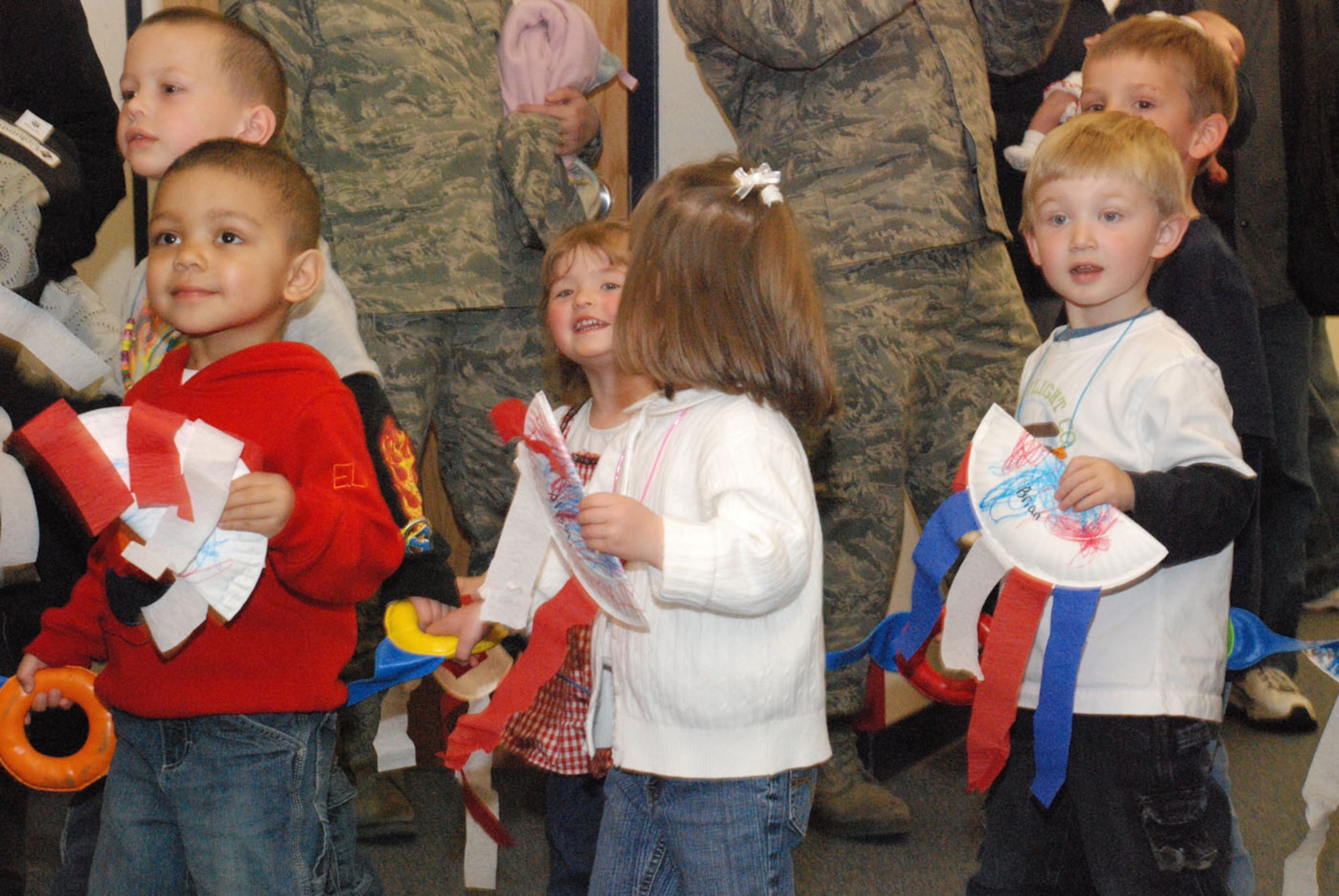 Zoe Grubaugh, Brian Osborne, Andrew Johnson, Nathan Fisher and Dominic Gray participate in the parade at the development center April 26. Each class made different patriotic items for the parade.