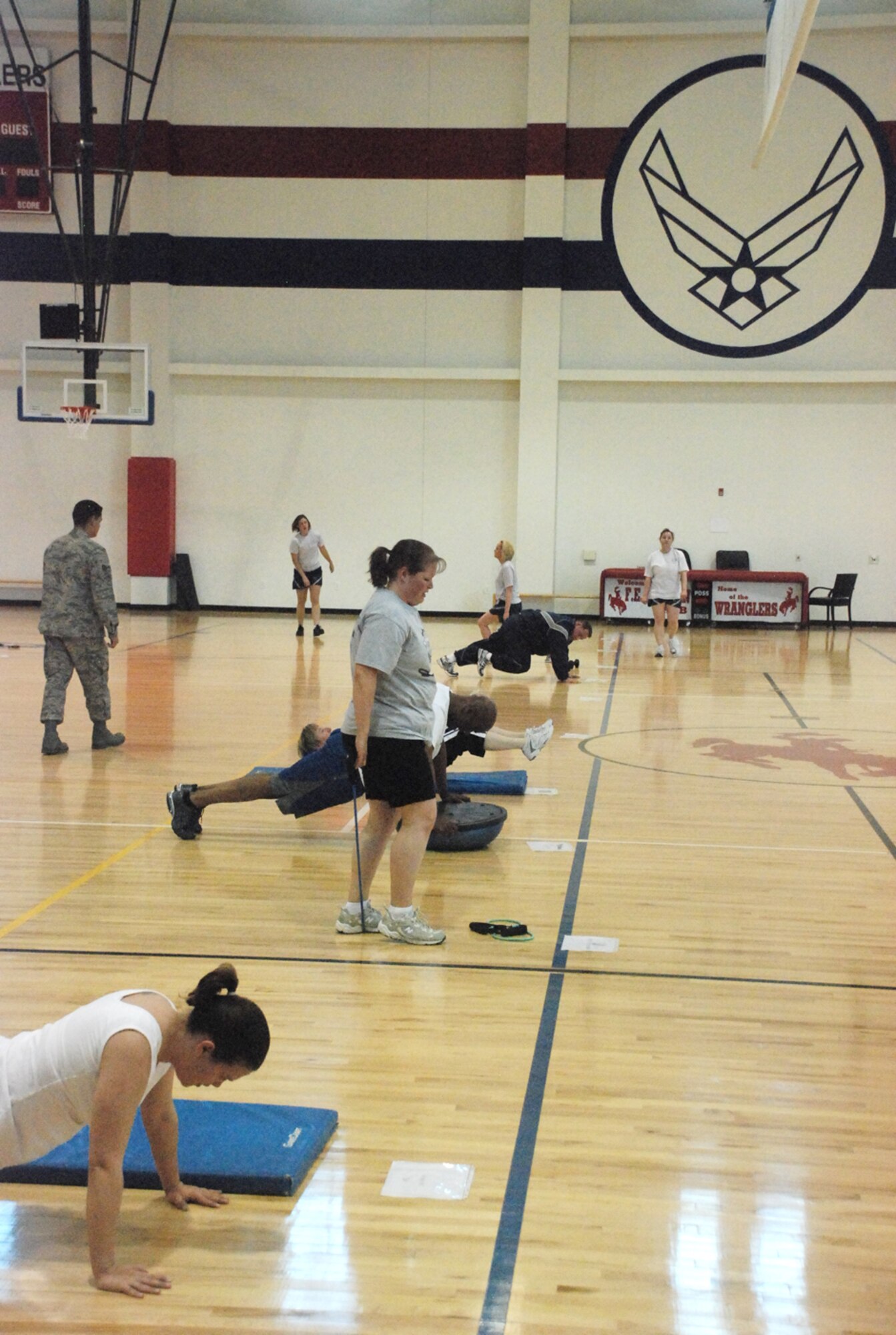 Nearly 23 Warren members participate in a mandatory workout for the Warren’s Biggest Loser competition April  24 in Freedom Hall Fitness Center. The workouts for the day was a series of 35 circuit training stations where each participant uses the station for 30 seconds and moves on to another station. The routine lasted about 30 minutes and was designed to keep them moving for the entire time in order to help them burn body fat (U.S. Air Force photo/Staff Sgt. Chad Thompson).
