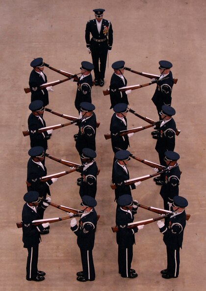 Members of the Air Force Honor Guard Drill Team perfom their large 16-man routine at the National High School Drill Team Competition for JROTC cadets in Daytona Beach, Fla. 4 May. The Drill Team is the traveling component of the Air Force Honor Guard and tours world-wide representing all Airmen and showcasing USAF precision to recruit, retain, and inspire for the Air Force mission. (U.S. Air Force photo by Senior Airman Dan DeCook)(Released)