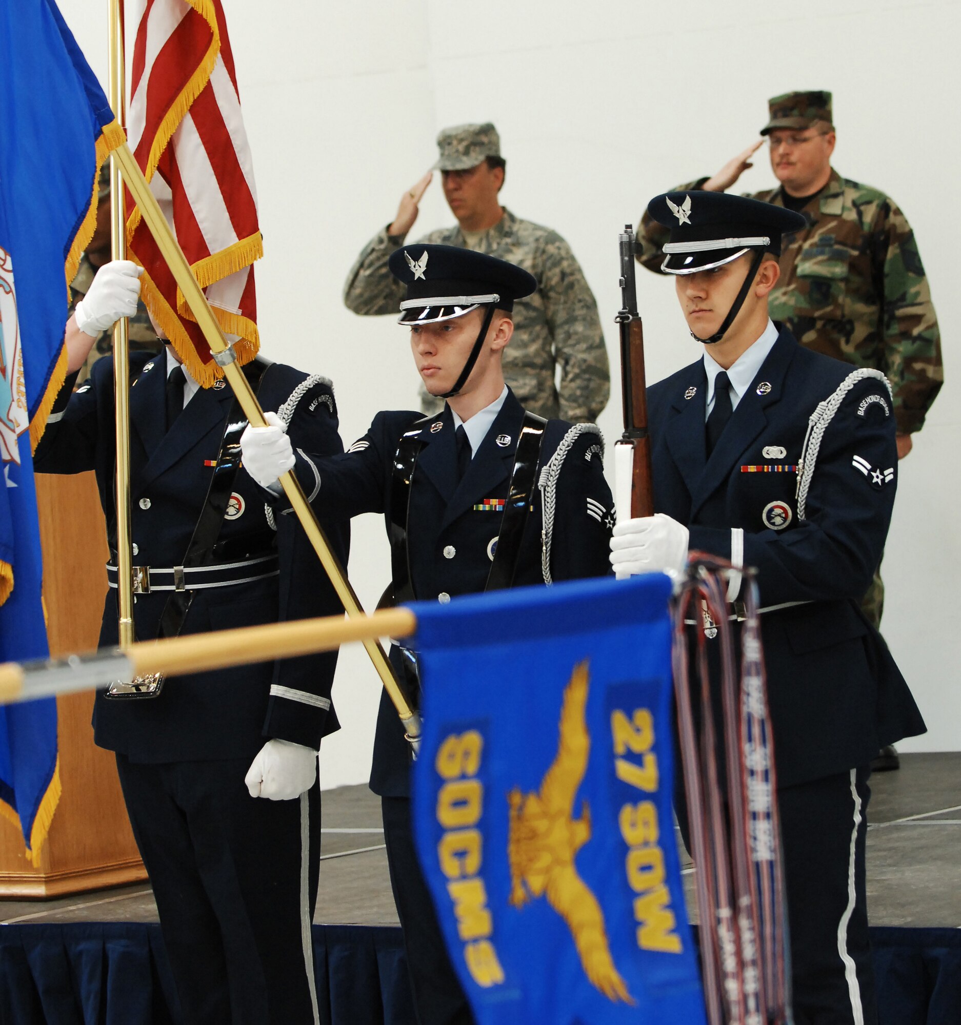 CANNON AIR FORCE BASE, N.M. - Airmen from the base honor guard present the colors during the 27th Special Operations Component Maintenance Squadron's change-of-command ceremony May 2. Maj. Andrew Young assumed command of the 27th SOCMS from outgoing commander Maj. Ryan Rowe. (U.S. Air Force photo/Airman 1st Class Liliana Moreno)