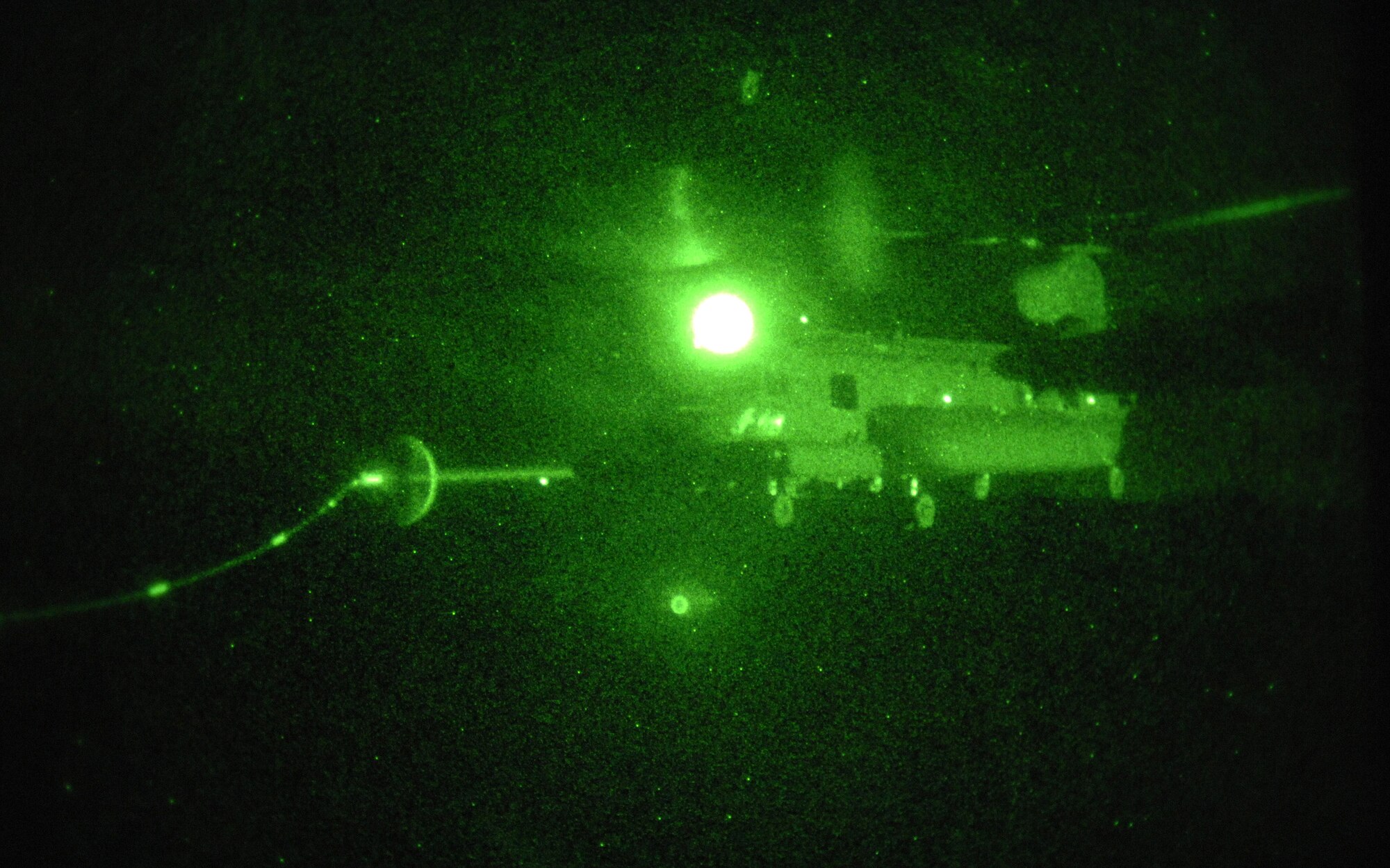 CANNON AIR FORCE BASE, N.M. - A MH-47 gets refueled from one of Cannon's MC-130Ws during a night training exercise April 30. The MC-130W performs missions primarily at night to reduce operational risk. (U.S. Air Force photo/Airman 1st Class Evelyn Chavez)