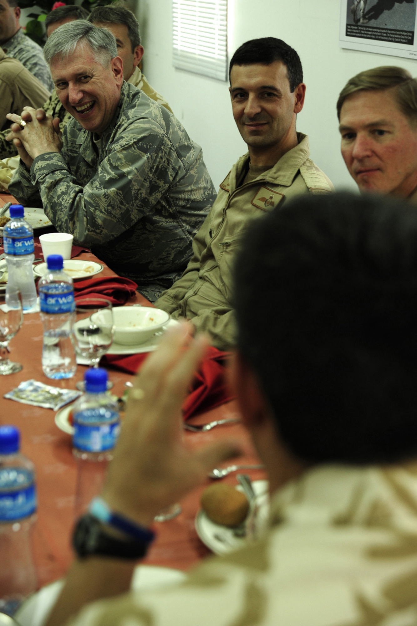 Gen. Roger Brady, U.S. Air Forces in Europe commander, meets with International Security Assistance Force personnel during his visit to the Combined Air and Space Operations Center. General Brady spoke with ISAF personnel concerning their impact and role in both Operation Iraqi Freedom and Operation Enduring Freedom. General Brady visited the CAOC on his way to other bases in the area of responsibility to meet with deployed Airmen from USAFE. (U.S. Air Force Photo by: Staff Sgt. Christina M. Styer) (RELEASED)*
