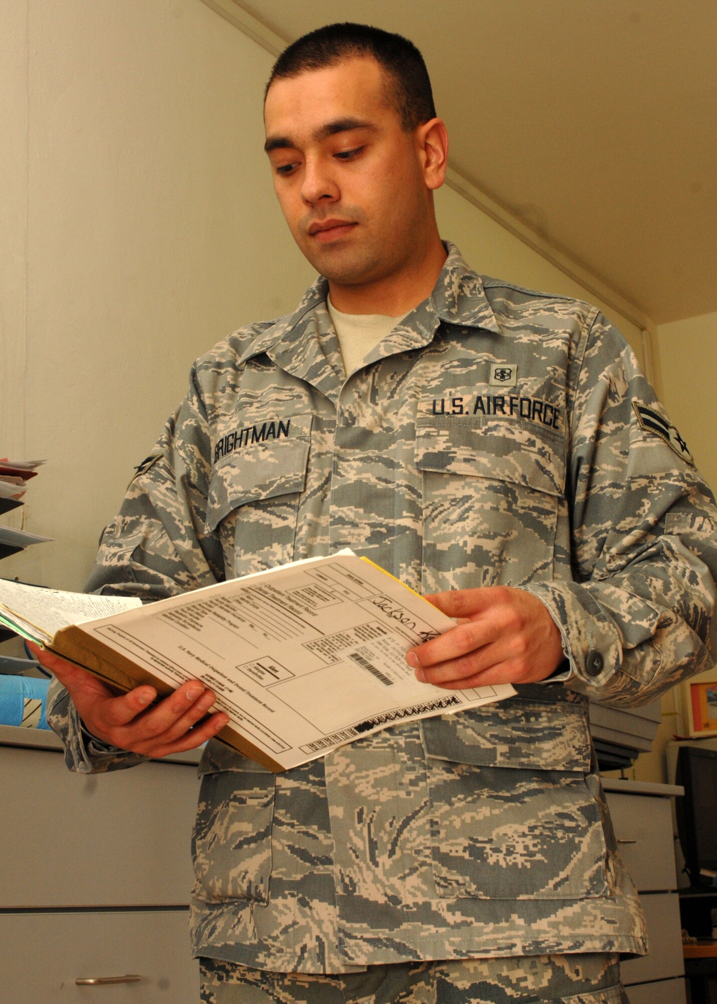 BITBURG AIR BASE, Germany -- Airman 1st Class Bryon Brightman, 52d Medical Operations Squadron, reviews files at the Pediatrics Clinic April 30, 2008. (U.S. Air Force photo by Airman 1st Class Jenifer Calhoun)