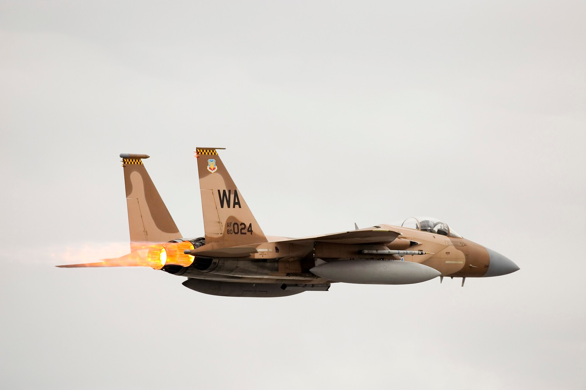 ELMENDORF AIR FORCE BASE, ALASKA -- A deployed F-15 from Nellis Air Force Base, Nev. takes off in full after-burners during Northern Edge '08 May 6. Northern Edge 2008, the largest military training exercise in Alaska, began May 5 with roughly 5,000 U.S. active duty, national guard, and reserve component Airmen, Soldiers, Sailors, and Marine participants. More than 120 aircraft play a part in this air-centric Alaskan Command exercise. (U.S. Air Force photo/Master Sgt. Keith Brown)