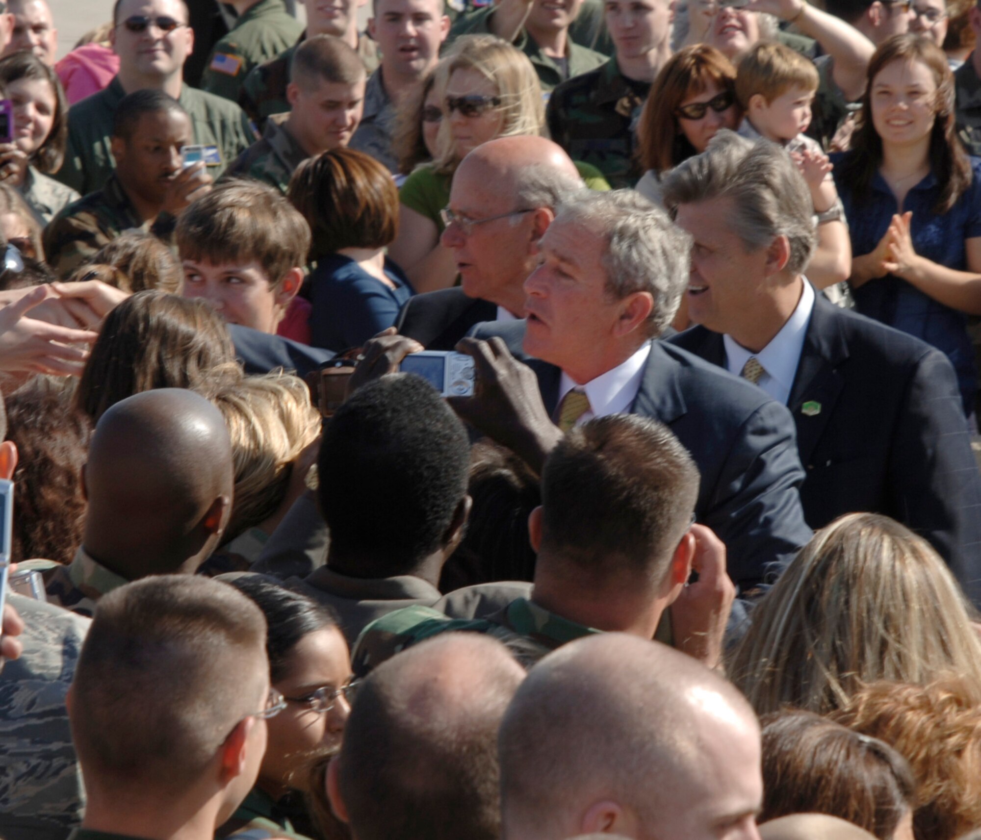 MCCONNELL AIR FORCE BASE, Kan. -- President George W. Bush takes a minute to meet and greet McConnell members before he departs Kansas on Air Force One, May 4. The president transitioned through McConnell to Greensburg to give a commencement speech to 18 high school graduates, despite their struggles from a F-5 tornado that devastated the town in May 2007.  (Photo by Senior Airman Roy Lynch)