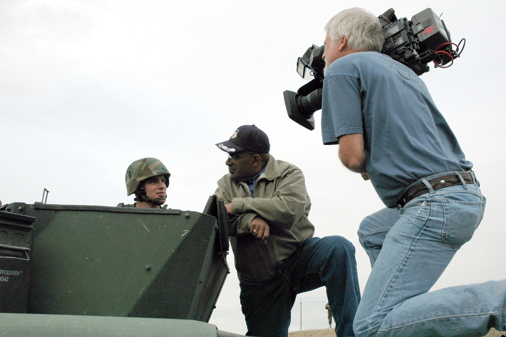 Al Roker, NBC's Today Show co-host, interviews Airman 1st Class David Blais, a 341st Missile Security Forces Squadron mobile fire teams member, on top of a HUMVEE near a missile alert facility near Malmstrom Air Force Base, Mont., May 5. (U.S. Air Force photo/Senior Airman Eydie Sakura) 