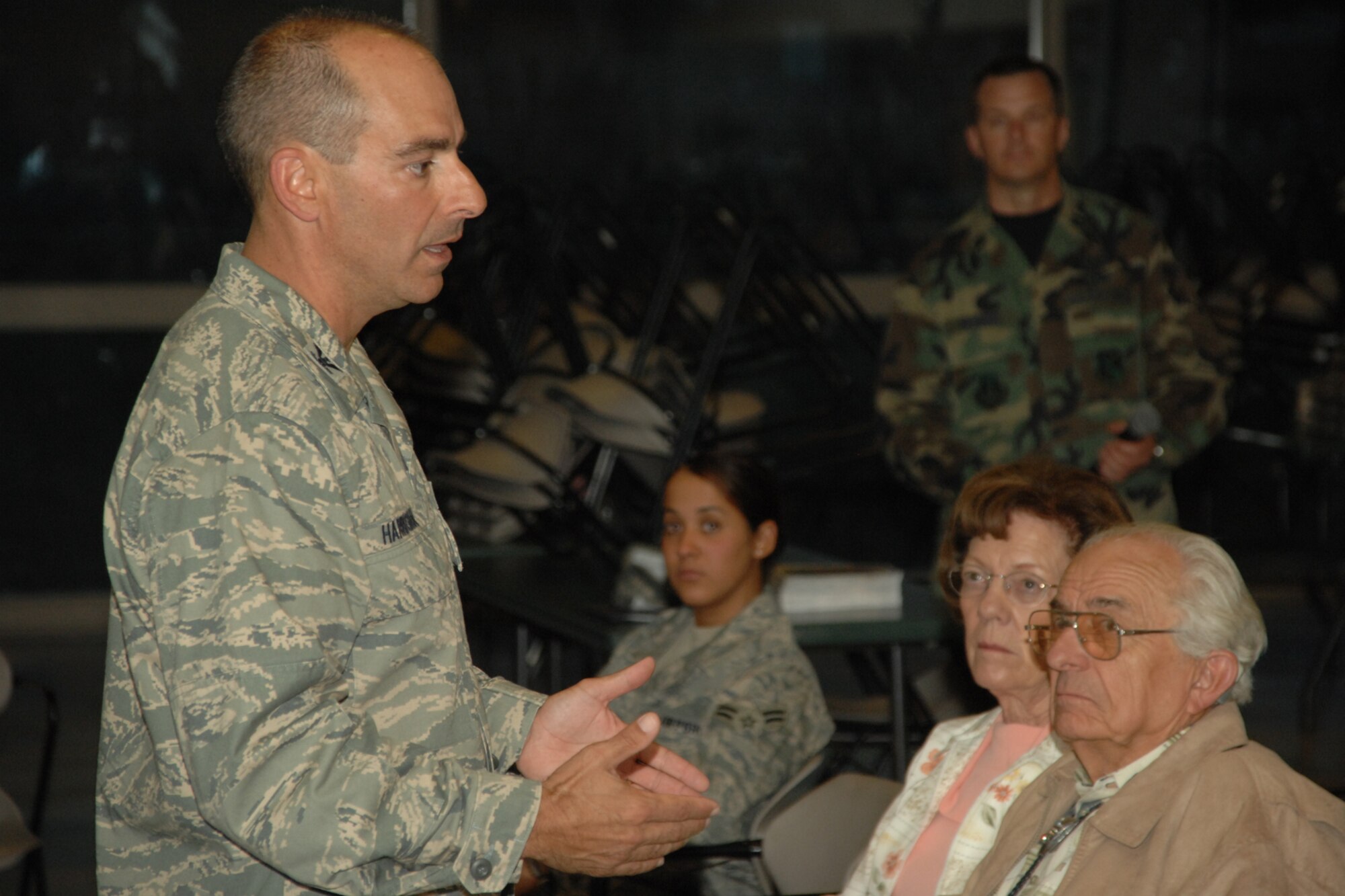 ALAMOGORDO, N.M.--49th Fighter Wing Commander Col. Jeff Harrigian speaks about Holloman Air Force Base's future during a town hall meeting here at the Alamogordo Senior Center. Colonel Harrigian also showed an F-22A Raptor video presentation and answered questions during the meeting. (U.S. Air Force photo/Airman 1st Class Jamal D. Sutter)