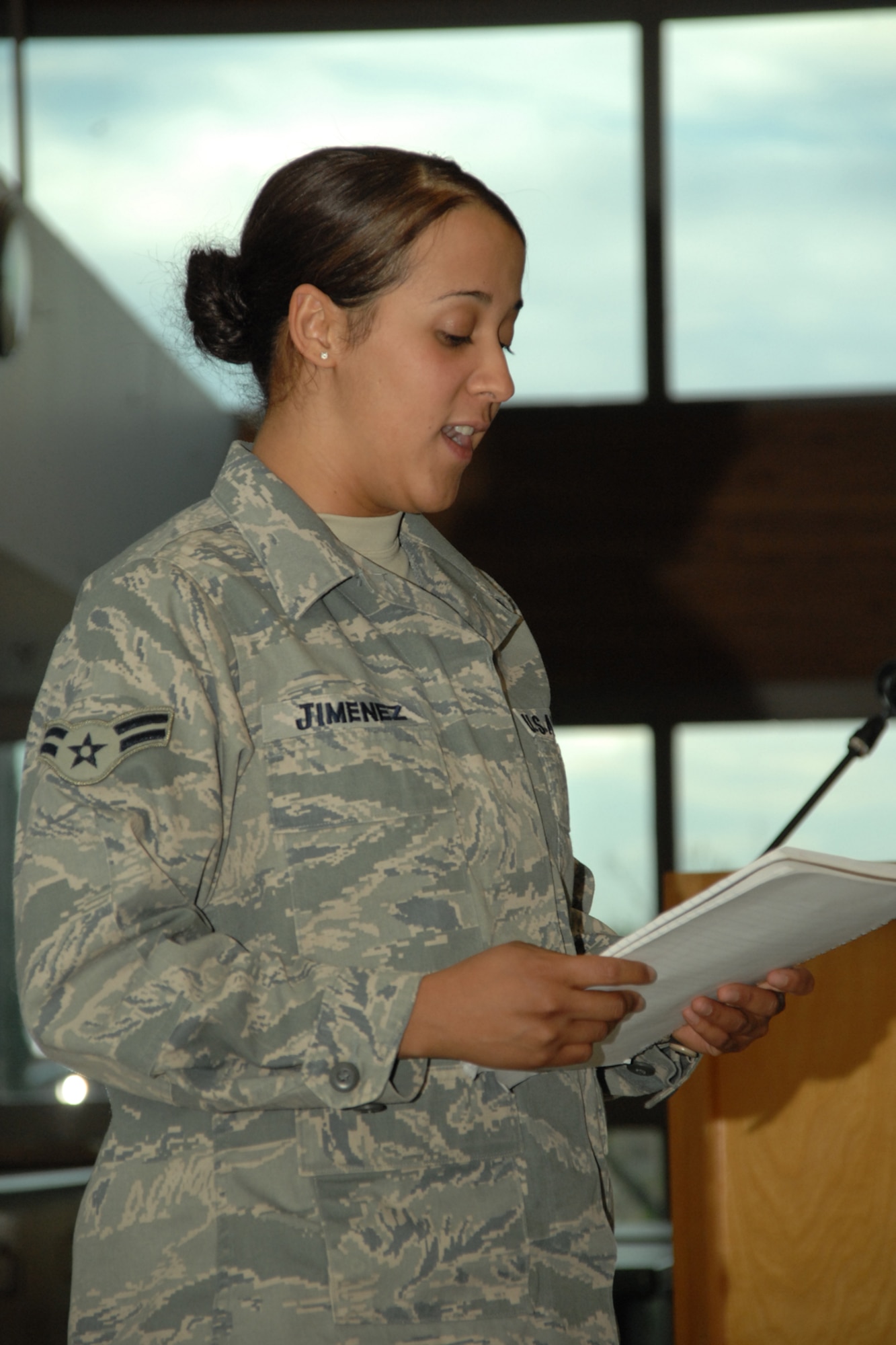 ALAMOGORDO, N.M.--Airman 1st Class Karla Jimenez, 49th Civil Engineer Squadron, discusses her experience while deployed to Bagram Air Base, Afghanistan, during a town hall meeting here at the Senior Citizens Center. More than 40 Alamogordo residents attended the meeting. (U.S. Air Force photo/Airman 1st Class Jamal D. Sutter)