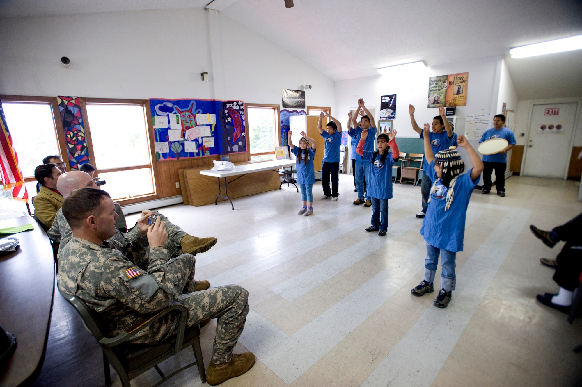 Chenega Bay, Alaska— The KuKaLaq Alutiiq dancers from Chenega Community School performs there native dances for a UH-60 crew from 1-52 Aviation Regiment as a part of community relations for starting Northern Edge on May 4, 2008. U.S. Forces want to make sure that the Northern Edge a joint exercise does not hinder the natives of Alaska. Northern Edge provides the opportunity to hone current and to test future applications of combat operations and weapon capabilities. (U.S. Air Force Photo by Airman 1st Class Jonathan Steffen)(RELEASED)