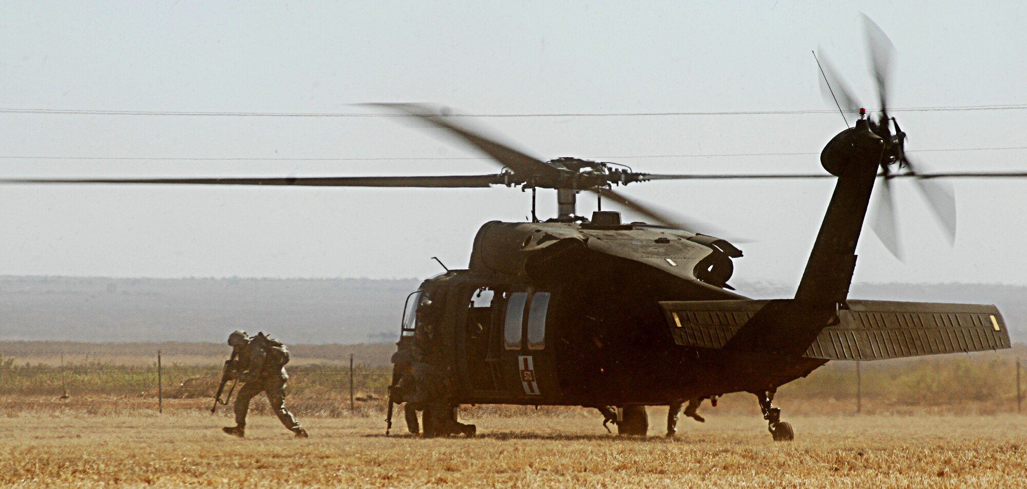 CANNON AIR FORCE BASE, N.M. -- An Army National Guard medical evacuation company simulates a  search and rescue mission with a pair of UH-60 Blackhawk helicopters during the 2008 Boss Lift on May 3.  Boss Lift is an annual event for reserve and national guard to showcase their skills for the New Mexico Committee for Employer Support of the Guard and Reserve.  (U.S. Air Force photo/Airman 1st Class Liliana Moreno)