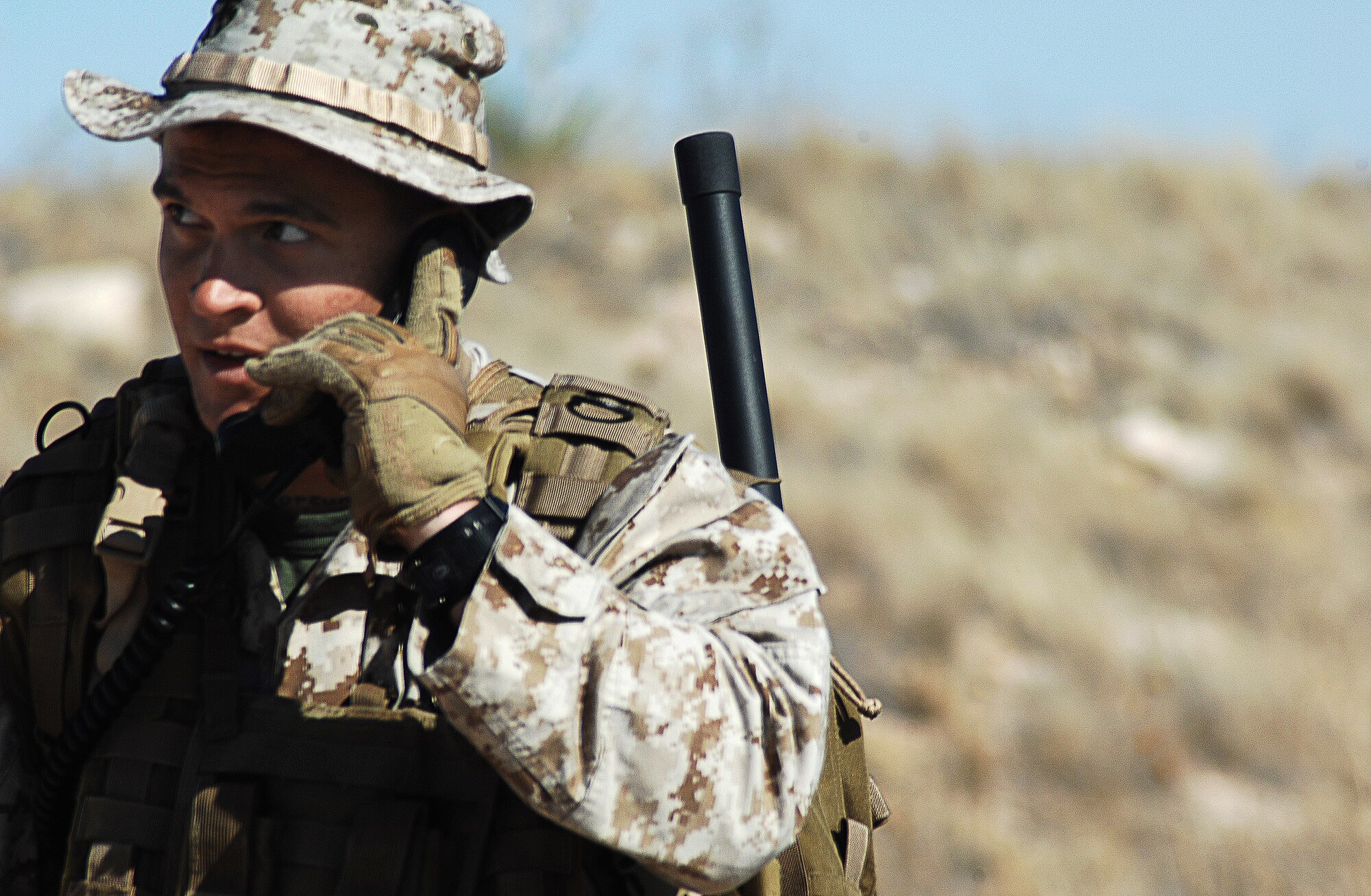 CANNON AIR FORCE BASE, N.M. -- Reservist Sgt. Paul Ramos, Delta Company, 4th Marine Reconnaissance Battalion, calls for aerial support during Boss Lift 2008 training at Melrose Bombing Range, on May 3. Sgt. Ramos and his team conducts and provides reconnaissance and security.  (U.S. Air Force photo/Airman 1st Class Liliana Moreno)
