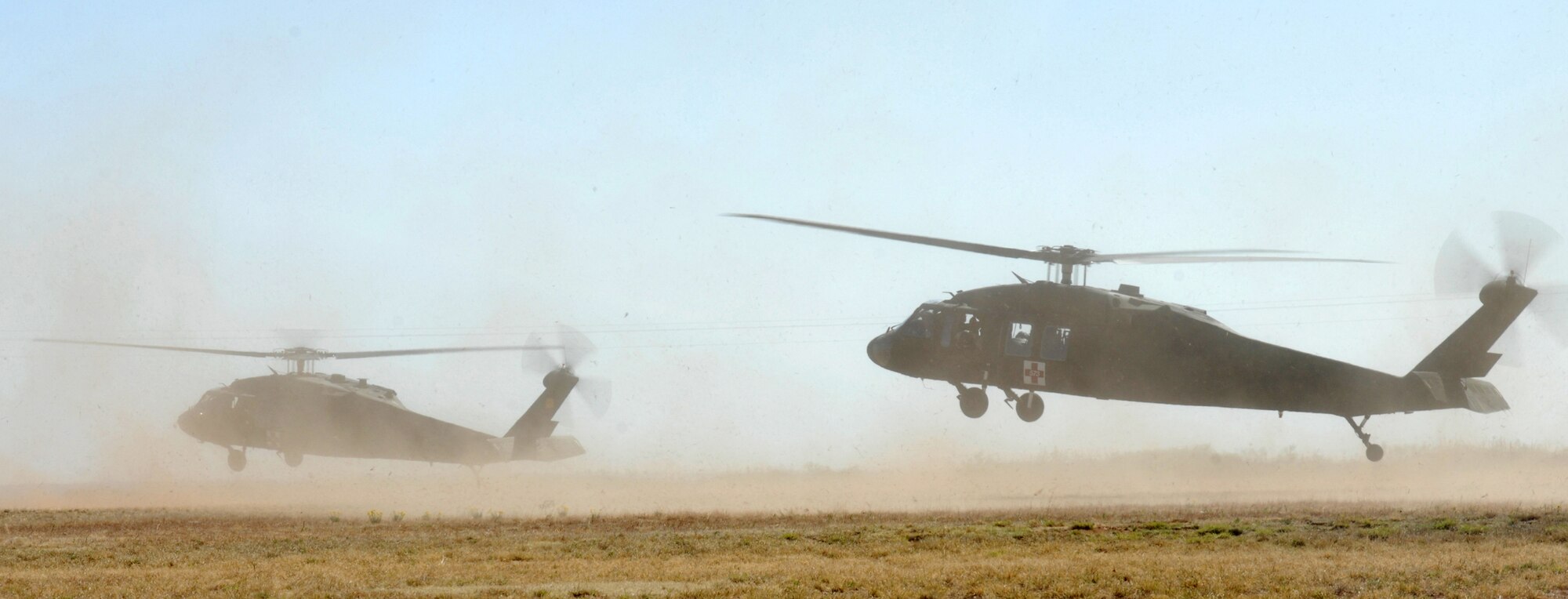 CANNON AIR FORCE BASE, N.M. -- An Army National Guard medical evacuation company simulates a search and rescue mission UH-60 Blackhawk helicopters during the 2008 Boss Lift on May 3.  Boss Lift is an annual event for reserve and guard forces in New Mexico to showcase their skills for the New Mexico Committee for Employer Support of the Guard and Reserve.  (U.S.Air Force photo/Airman 1st Class James Bell)