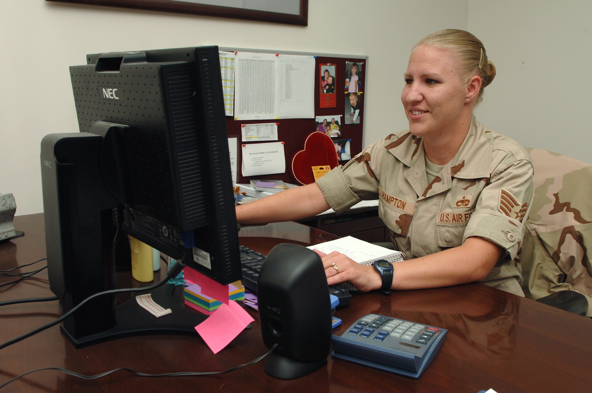 Staff Sgt. Carrie Hampton, 380th Expeditionary Maintenance Squadron E-3 Sentry maintenance analyst, analyzes data at her work station at a base in Southwest Asia, April 23, 2008. Sergeant Hampton was the 380th Air Expeditionary Wing's Warrior of the Week for the week of April 25, 2008. (U.S. Air Force photo/ Senior Airman Levi Riendeau)