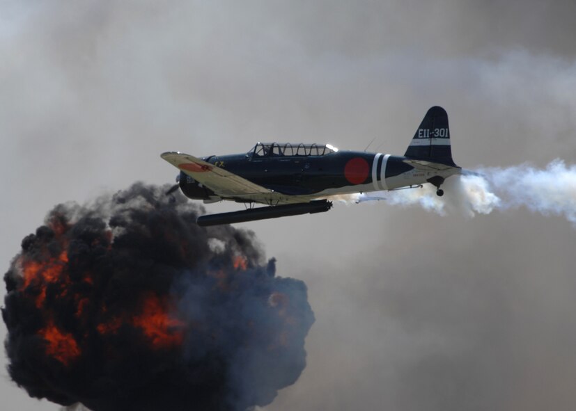 DYESS AIR FORCE BASE, Texas-- the Japanese WWII aircraft reenacts the battle of Pearl Harbor of ?Tora! Tora! Tora!? during the air show, May 3.