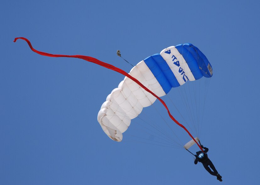 DYESS AIR FORCE BASE, Texas-- the Wings of Blue Parachute team demonstrates their routine during the Air show on May 3.