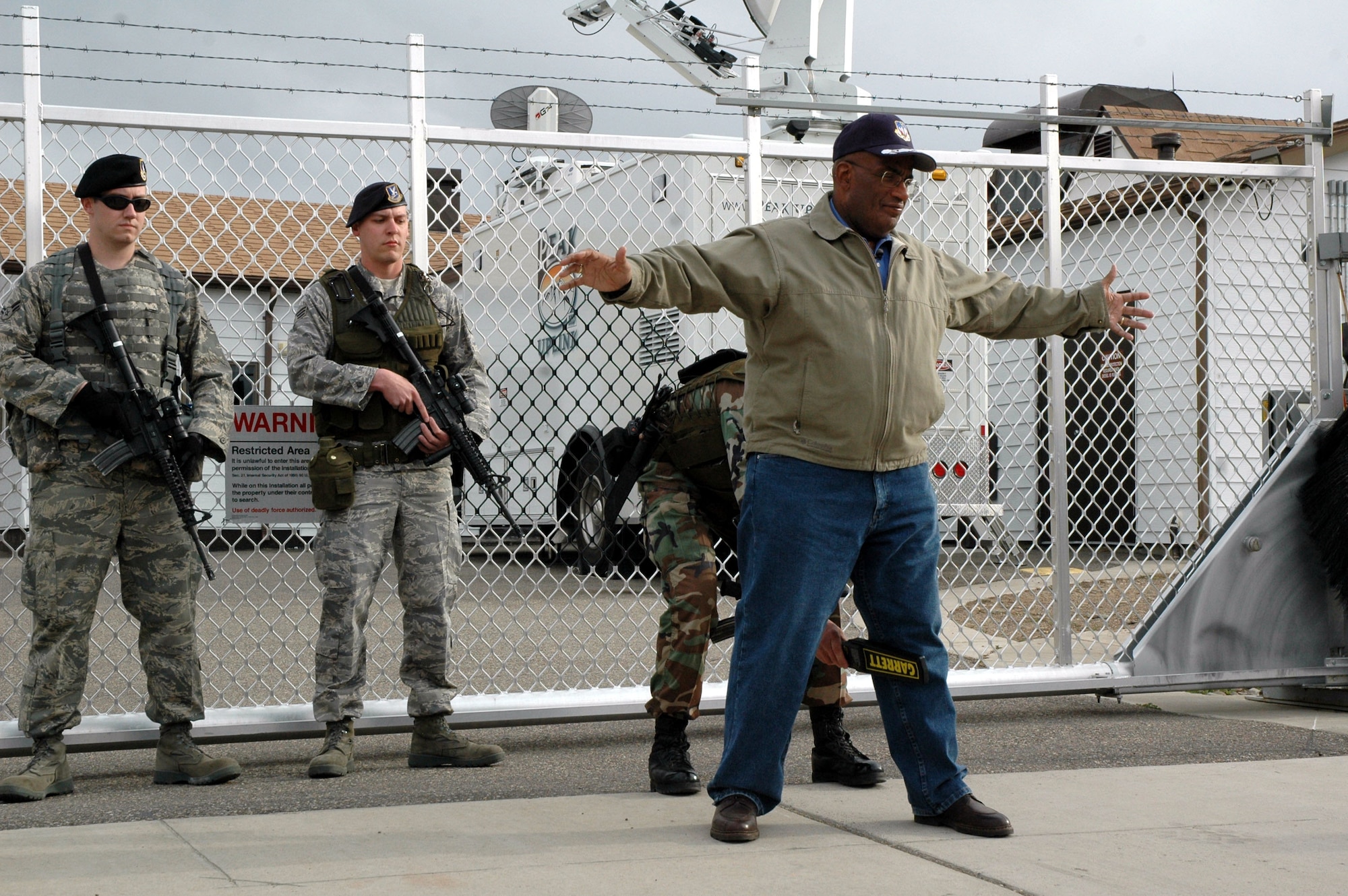 A security controller searches Al Roker, NBC’s Today Show co-host, before entering a missile alert facility near Malmstrom Air Force Base, Mont., May 5.  Mr. Roker broadcast live from the facility May 6 as part of their “Access Granted” series, which puts cameras in high-security places.  (U.S. Air Force photo/Senior Airman Eydie Sakura)