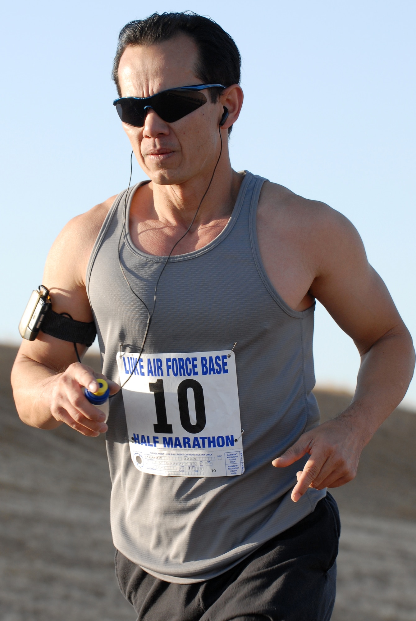 Mr. Jack Griffor listens to music during the half marathon held at Luke Air Force Base, Ariz., May 3. Fifty four runners logged more than 700 miles during the Saturday run.(U.S. Air Force Photo/ Staff Sergeant Jerry Fleshman)