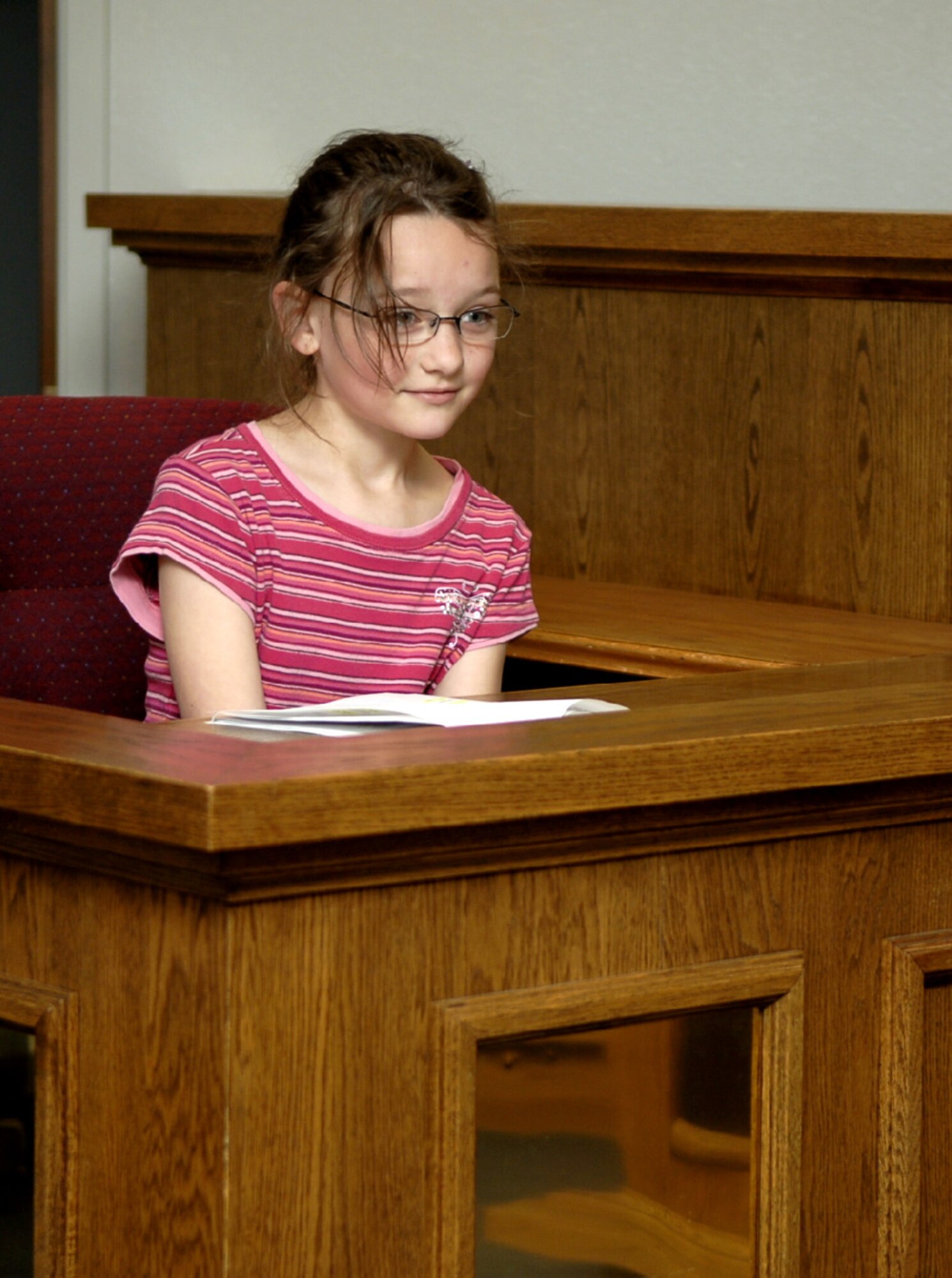 MOUNTAIN HOME AIR FORCE BASE, Idaho -- McKenzie Bartles, a fourth grader from the Base Primary School who is playing the ogre’s wife from the children’s story Jack and the Beanstalk, gives her testimony to the court during a mock trial hosted by the 366th FW Legal Office, which is trying to determine if Jack is guilty of murdering the ogre as part of Law Day April 30. After deliberation, Jack was found innocent. Sponsored by the American Bar Association, Law Day is held May 1, and this year’s theme was “The Rule of Law: Foundation for Communities of Opportunity and Equity.” Children also made posters depicting their favorite laws. (U.S. Air Force photo/Airman 1st Class Samantha S. Crane)