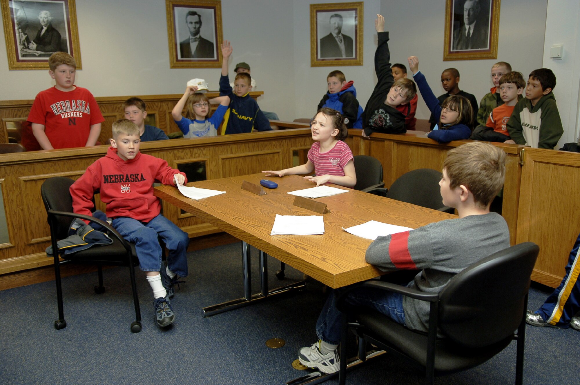 MOUNTAIN HOME AIR FORCE BASE, Idaho -- Fourth graders from the Base Primary School debate whether Jack Robinson, from the children’s story Jack and the Beanstalk, is guilty of murdering the ogre during a mock trial hosted by the 366th Fighter Wing Legal Office as part of Law Day April 30. After deliberation, Jack was found innocent. Sponsored by the American Bar Association, Law Day is held May 1, and this year’s theme was “The Rule of Law: Foundation for Communities of Opportunity and Equity.” Children also made posters depicting their favorite laws. (U.S. Air Force photo/Airman 1st Class Samantha S. Crane)